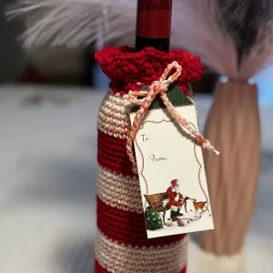 Crochet wine bottle sleeve.
